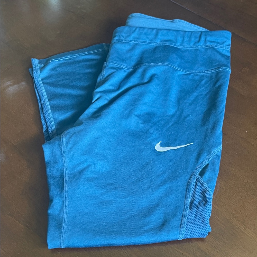 Nike green cropped leggings, size large.